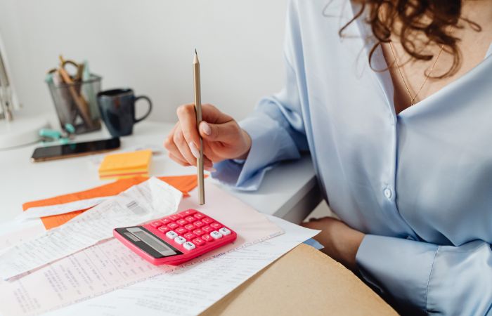 Professional bookkeeper reviewing financial documents